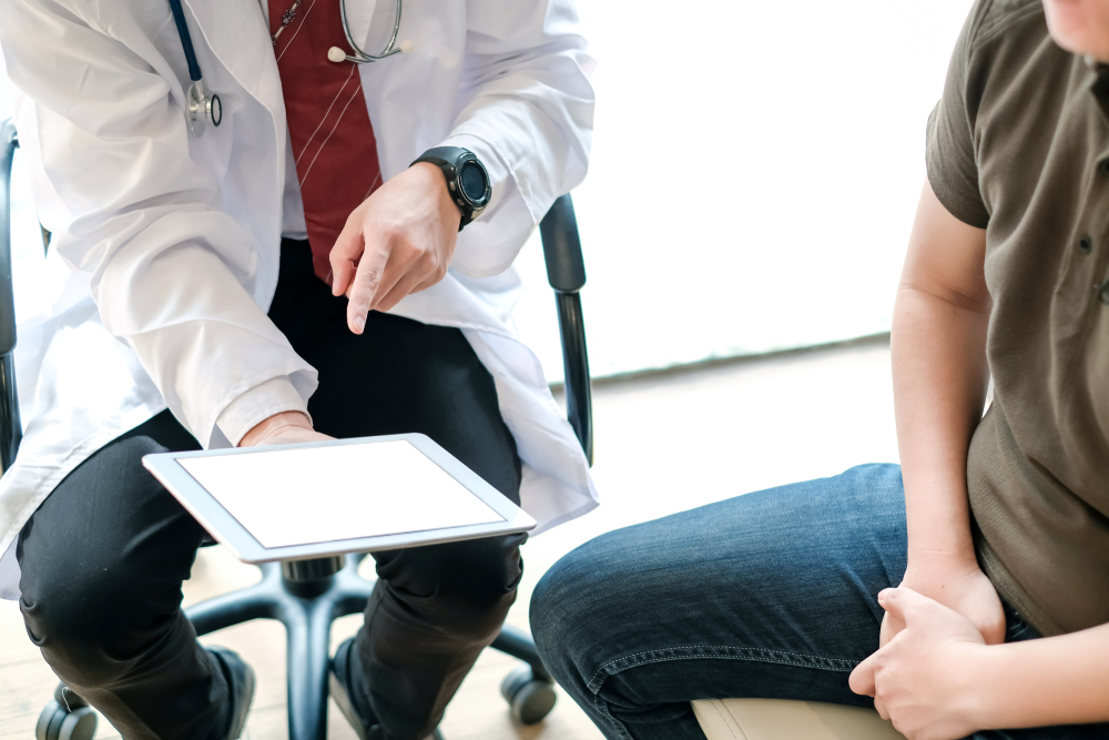 doctor talking to patient